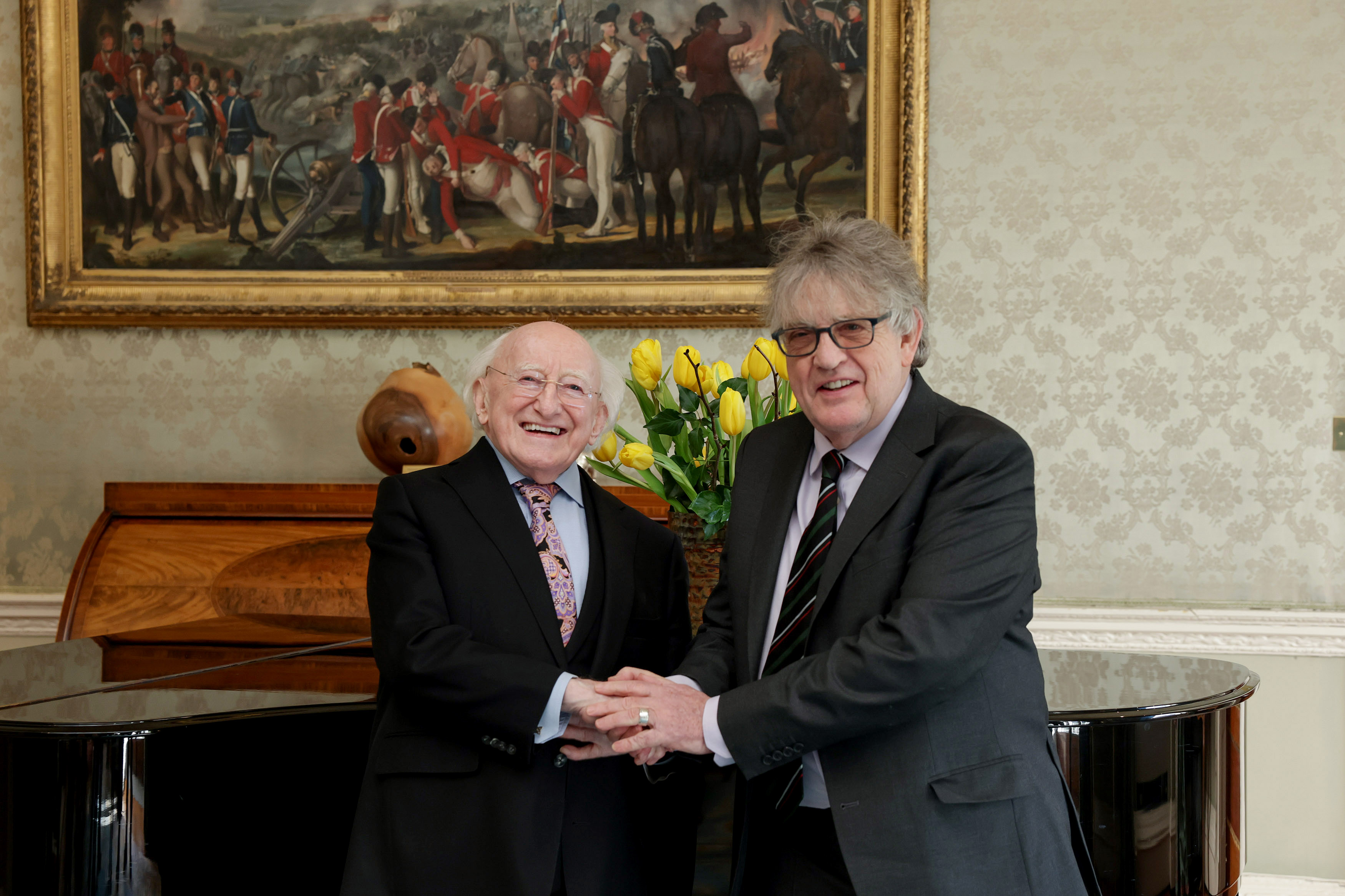 President Michael D. Higgins confers Paul Muldoon with the title of Saoi